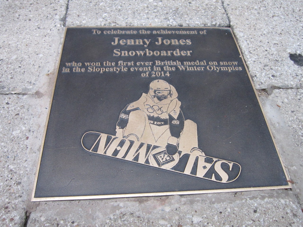 Close up of Jenny Jones  plaque inlaid in the pavement