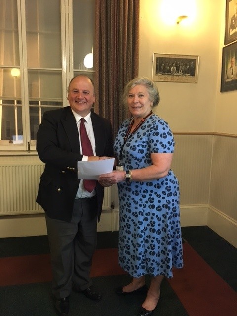 Photo shows Councillor Janet Biggin being congratulated on the Parish Council's achievement by Councillor Matthew Riddle, Leader of South Gloucestershire Council at that time.