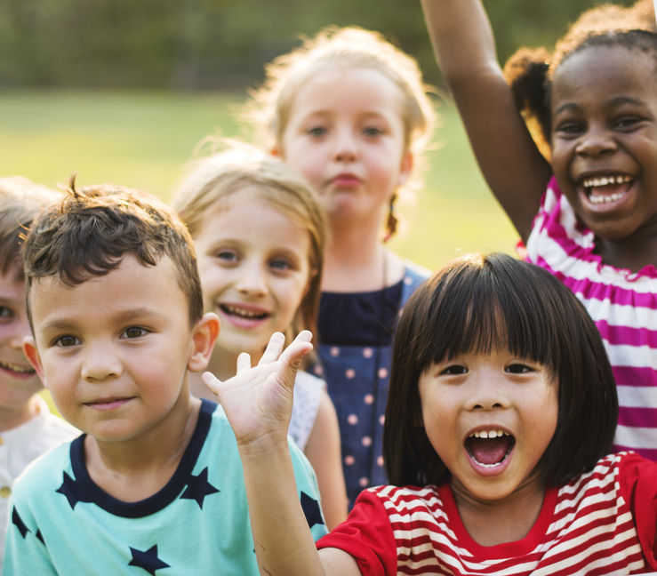 A photo of six happy smiling children.